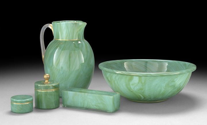 Loetz Marmoriertes Glass Toilet Set: Loetz Marmoriertes Glass Toilet Set, fourth quarter 19th century, the set containing a wash basin and pitcher, each with ground pontils and gilt trim, dia. 15-3/4", bowl, h. 8-1/4", pitcher, two cover