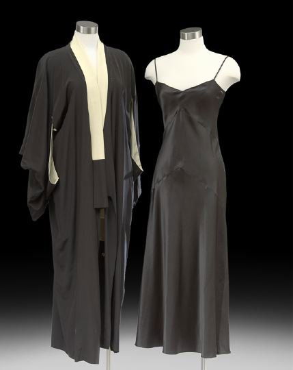 Vintage Black and White Satin Gown and Robe: Vintage Black and White Satin Gown and Robe, ca. 1970-1980, the black satin gown with spaghetti straps and fitted through the bust line, Tootsie's Houston label, size 4, together with a black satin ro