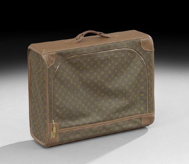 Louis Vuitton, Paris, Softside Suitcase: Louis Vuitton, Paris, Monogram Canvas and Chocolate Brown Leather Softside Suitcase, with a full zippered opening at one side, the chocolate brown cotton-lined interior with two elasticized snap pouch