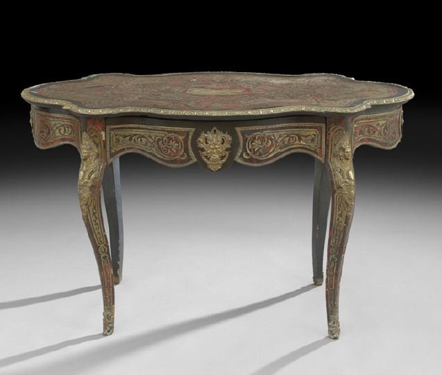 Napoleon III Boulle and Ebonized Center Table: Napoleon III Boulle and Ebonized Center Table, third quarter 19th century, the turtle-form top centered by a brass inlay of a classical chariot, surrounded by an elaborate boulle panel, with a foliate