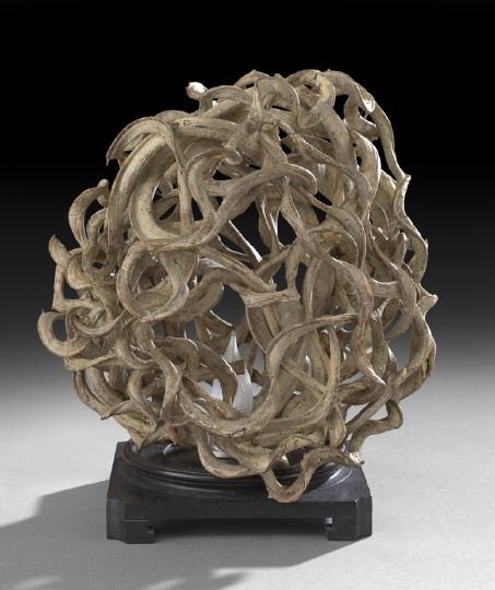 Unusual Root and Ebonized Table Lamp: Unusual Root and Ebonized Wood Table Lamp, formed of a sphere of interlacing roots raised on an electrified ebonized pedestal, h. 15", dia. 13".