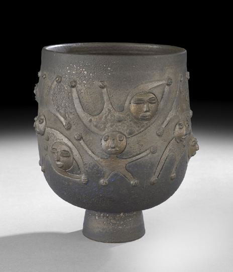 Edwin (1910-2008) & Mary Scheier (1908-2007): Edwin Scheier (American, 1910-2008) and Mary Scheier (American, 1908-2007), Footed Ceramic Pot, depicting soaring male and female figures, with a textured deep charcoal glaze, the figures subtly highl