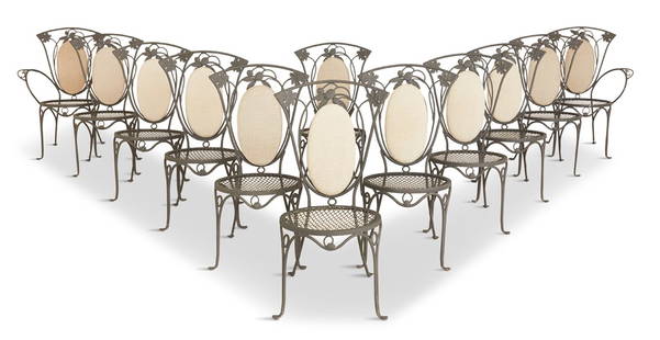 John Salterini Iron "French Provincial" Dining Chairs: Set of Twelve Labeled John Salterini Iron "French Provincial" Dining Chairs mid-20th century, New York, comprised of a pair of armchairs and ten side chairs, decorated with leaves and fruit, the backs