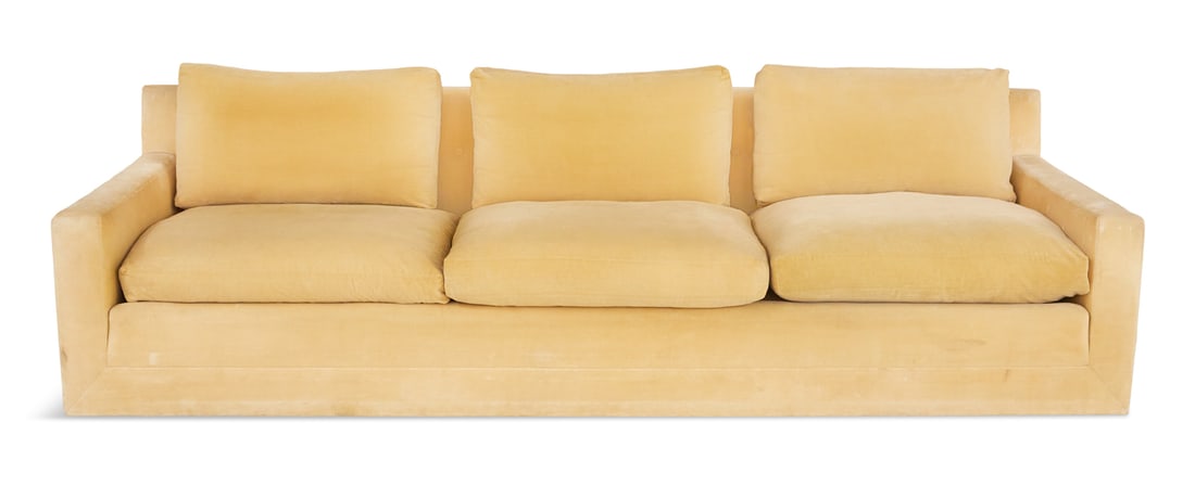 Long, Three-Cushion Velvet Sofa: Long, Three-Cushion Velvet Sofa 1970s, the low, button-tufted back faced with three loose cushions above three loose seat cushions, all down-filled, and raised on six small, square block "hidden" feet