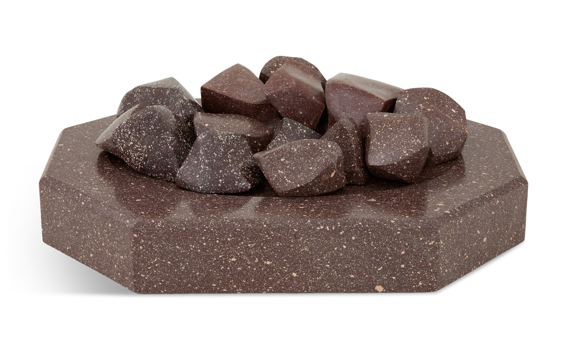 Stephen Cox (British, b. 1946): Stephen Cox (British, b. 1946) "Cruel Stones of St. Stephen", 2007 hand-carved Egyptian porphyry 14 movable elements atop a hexagonal base. h. 6-1/4", w. 18-1/2", d. 13-3/4" Provenance: Adrian Sassoon