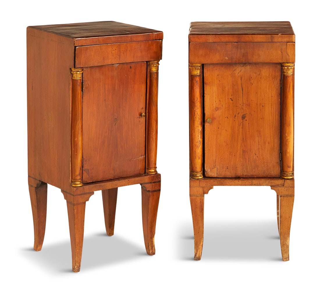 Diminutive Pair of Italian Fruitwood Cabinets: Diminutive Pair of Italian Fruitwood Cabinets 18th century, in the neoclassical taste, each with a drawer above a cabinet door flanked by parcel-gilt pilasters, the interior with two shelves, raised o