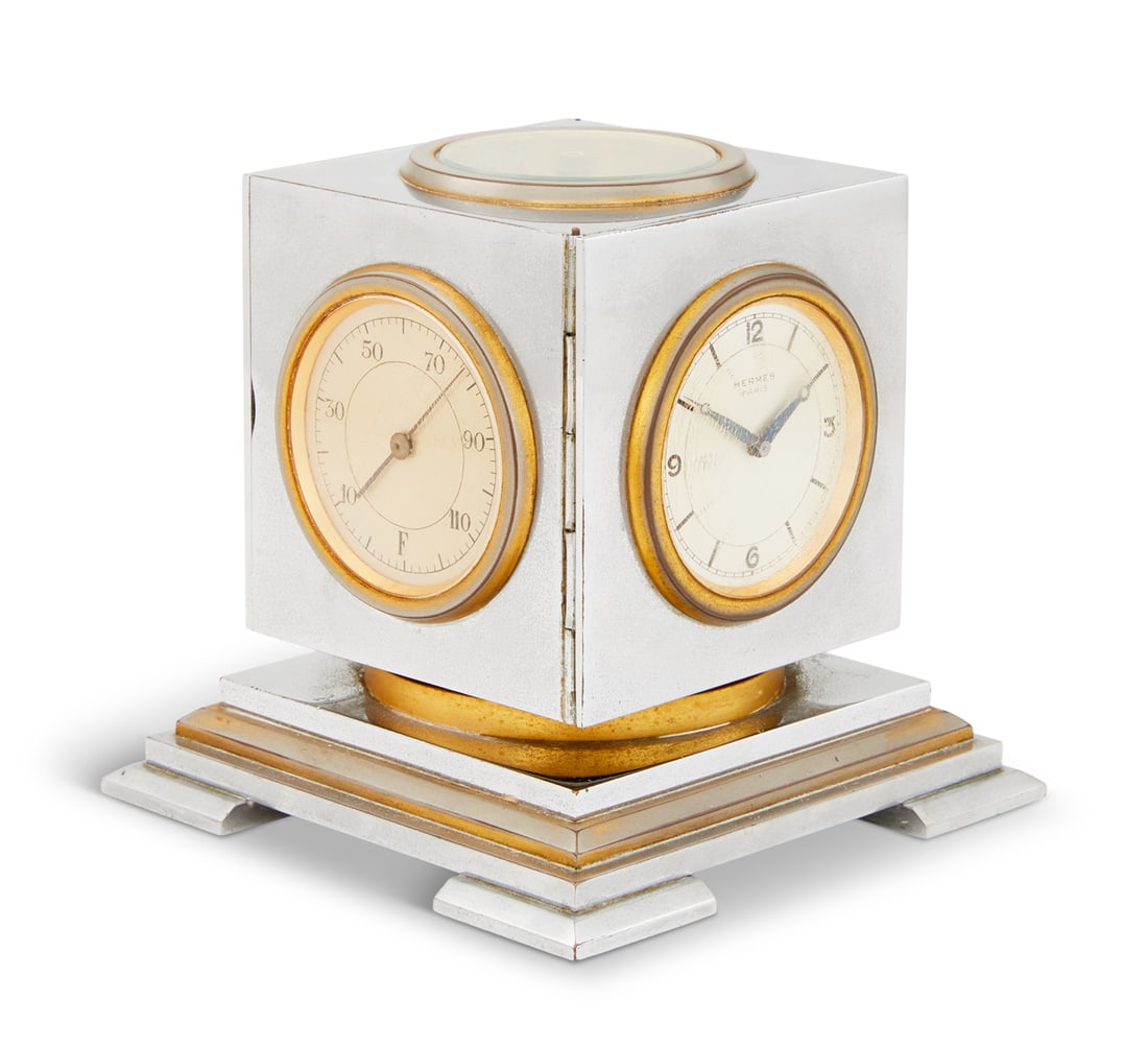 Hermes Chrome-Plated Compendium Desk Clock: Hermes Chrome-Plated and Gilt-Brass Compendium Desk Clock 20th century, the design attributed to Paul Dupre-Lafon (1900-1971), the top set with a compass and the swivel sides set with a clock, baromet