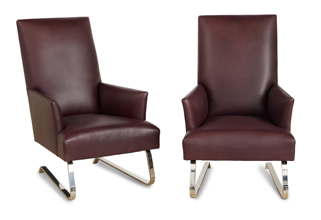 Pair of Donghia "Odeon" Leather Lounge Chairs: Pair of Donghia "Odeon" Burgundy Leather Lounge Chairs on chromed steel backswept "runner" supports, both examples labeled "Donghia" underneath the seat. h. 39", w. 25-1/4", d. 34"