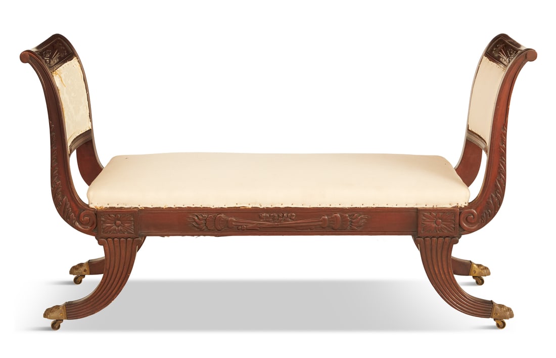 Rare American Classical Mahogany Window Seat: Rare American Classical Mahogany Window Seat first quarter 19th century, School of Duncan Phyfe, New York, with a padded seat and ends, the crest rails and front seat apron with carved crossed flame t