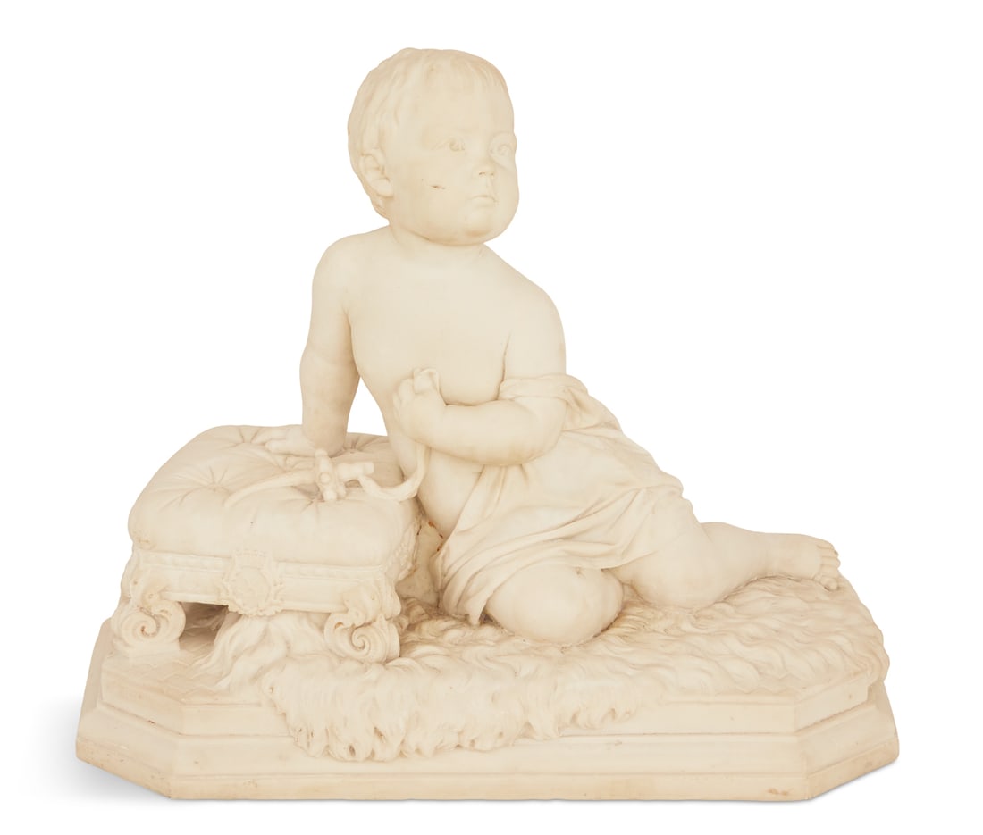 Handsome Carved Marble Figure of a Baby: Handsome Carved Marble Figure of a Baby mid-19th century, probably Italian, the crawling, draped baby leaning on a tufted Rococo Revival footstool, poised on a fur rug and clutching a rattle, on a car