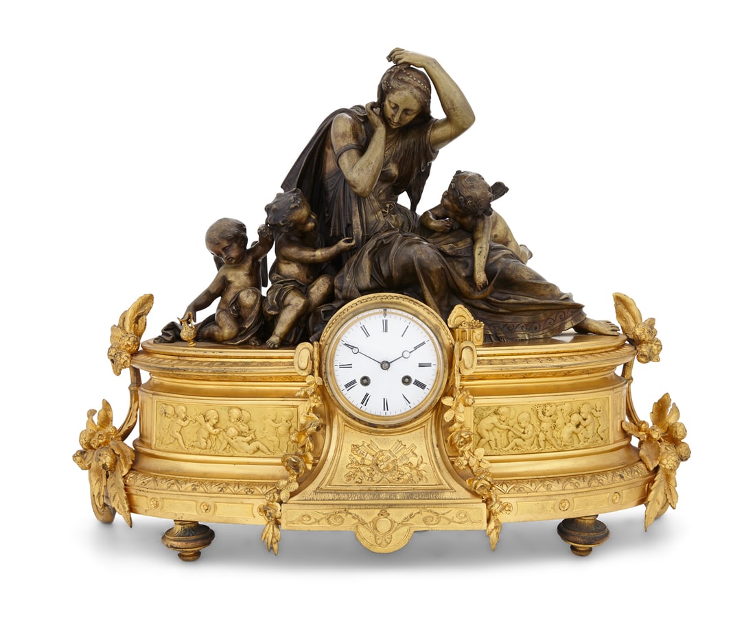 Handsome Napoleon III Bronze Figural Clock: Handsome Napoleon III Bronze Dore et Patine Figural Clock third quarter 19th century, mounted with a figure of Venus, with pearls in her hair, attended by cherubs, the clock dial with a bezel supporti