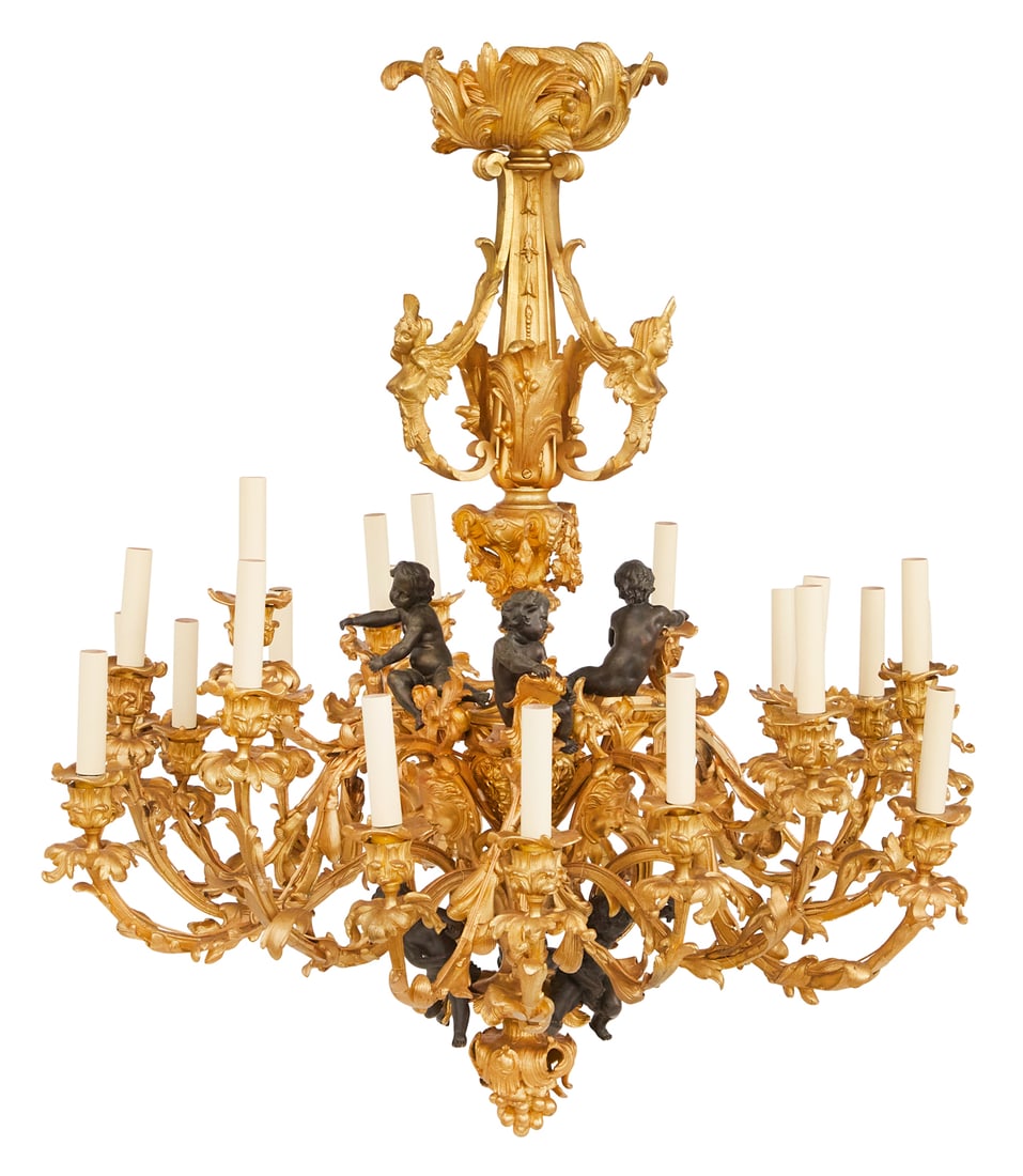 French Belle Epoque Gilt-Bronze Chandelier: French Belle Epoque Gilt-Bronze Chandelier fourth quarter 19th century, in the Louis XV taste, the twenty-one-light chandelier having a standard decorated with scrollwork, supporting female busts, swa