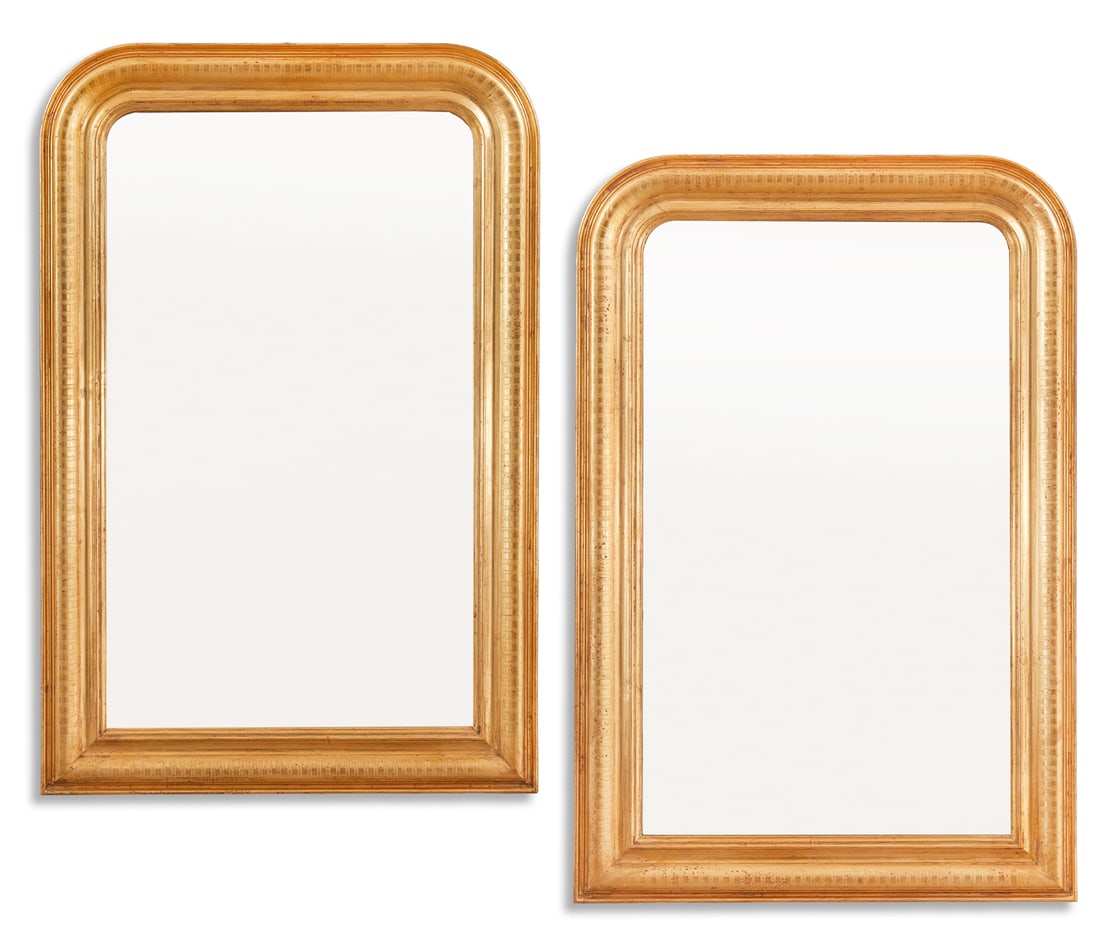 Pair of Louis Philippe-Style Giltwood Mirrors: Pair of Louis Philippe-Style Giltwood Mirrors late 20th century, the mirror with rounded corners and molded giltwood surrounds with an unusual incised edge. h. 47-3/4", w. 31-1/2"