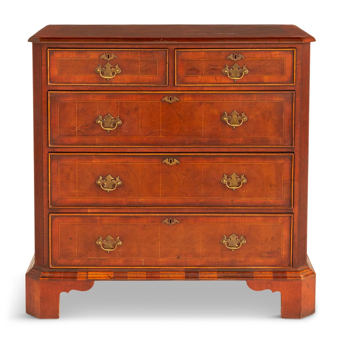 George III-Style Walnut and Fruitwood Chest: George III-Style Walnut and Fruitwood Chest 20th century, the rectangular top banded and with canted corners, featuring decorative pierced veneers, above a conforming case fitted with two short drawer