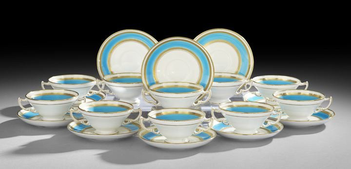 Set of Ten Minton Cream Soup Bowls with Stands: Set of Ten Minton Handled Cream Soup Bowls with Stands, ca. 1914-1950, retailed by Tiffany and Company, New York, each decorated with raised gilt borders framing a band of bleu celeste, bowls, dia. 5-