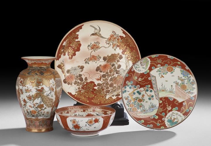 Four Pieces of Japanese Stoneware and Porcelain: Group of Four Pieces of Japanese Stoneware and Porcelain, 19th century, comprised of two bowls and a vase in red Kutani ware, all signed "Kutani", vase, h. 12", bowls, dia. 9-1/4" and 14-1/4", togethe