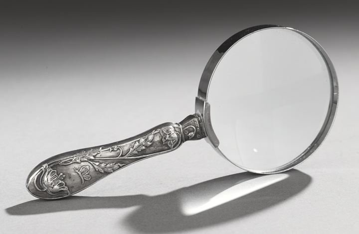 German Jugendstil .800 Silver Magnifying Glass: German Jugendstil .800 Silver Magnifying Glass, fourth quarter 19th century, by Pausch & Pohl, Berlin, the spatulate handle embossed with scrolling poppies and butterflies, with a later chromed steel 