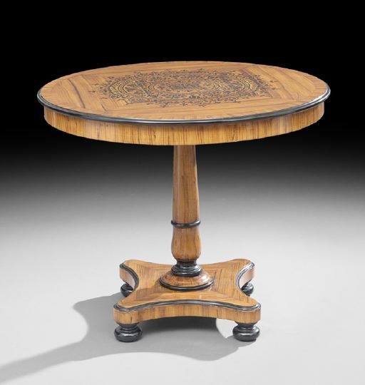 Biedermeier-Style Blonde Wood Center Table: Biedermeier-Style Blonde Wood Center Table, the circular top banded and quarter-veneered and with an elaborate applied stencil central medallion, raised on a graduated standard to a concave platform r