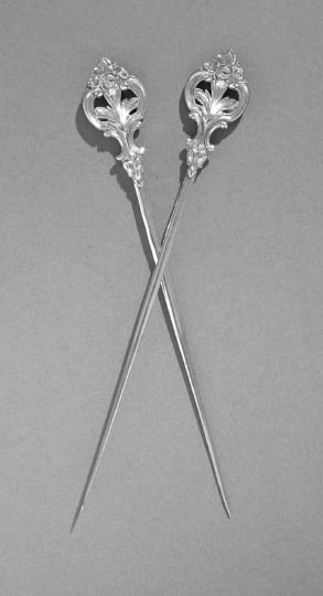 Good Pair of Christofle Silverplate Meat Skewers: Good Pair of Christofle Silverplate Meat Skewers, ca. 1900, Paris, each with an openwork rococo-style finial of floral-crested "C"-scrolls and acanthus fronds, l. 8-1/4".