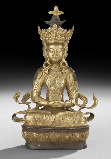 Chinese Bronze Buddhist Image: Chinese Bronze Buddhist Image, 20th century, the figure seated with four faces, parcel-gilt surface, h. 12-1/2".
