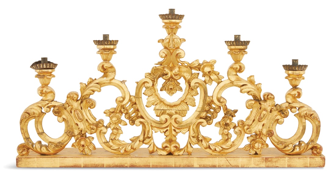 Large Italian Giltwood Candelabra: Large Italian Giltwood Candelabra in the Baroque Taste ca. 1900, the oblong candelabra set with carved, pierced giltwood scrollwork, rocaille work and flower heads supporting leaf-carved candle holder