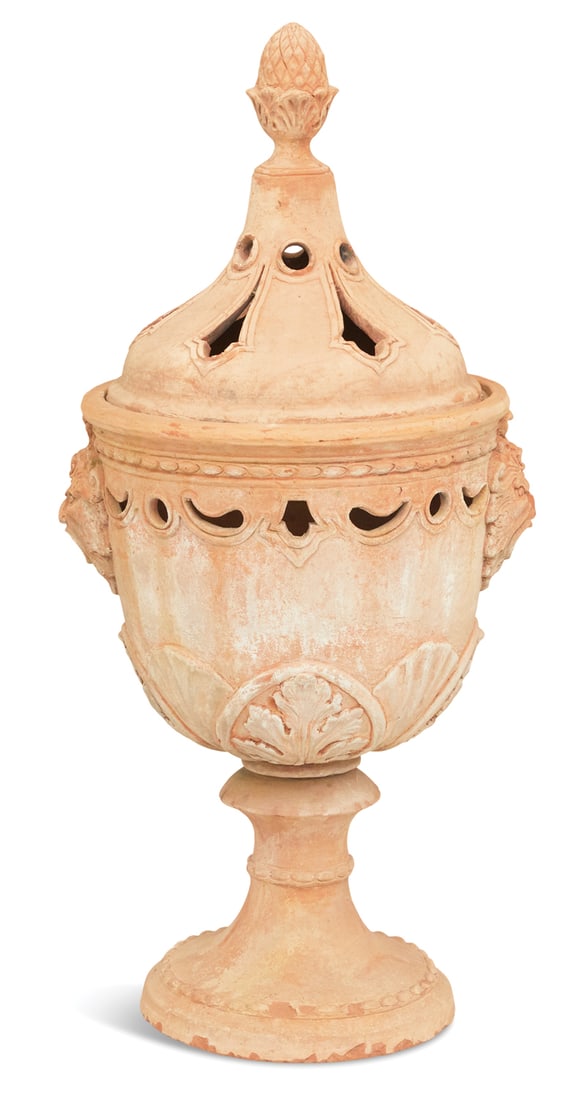 Terracotta Lidded Urn in the Baroque Taste: Terracotta Lidded Urn in the Baroque Taste 20th century, the pierced cover with an acorn-form knop, above an urn with beaded trim around the upper rim, the sides with masques with pierced mounts, flan
