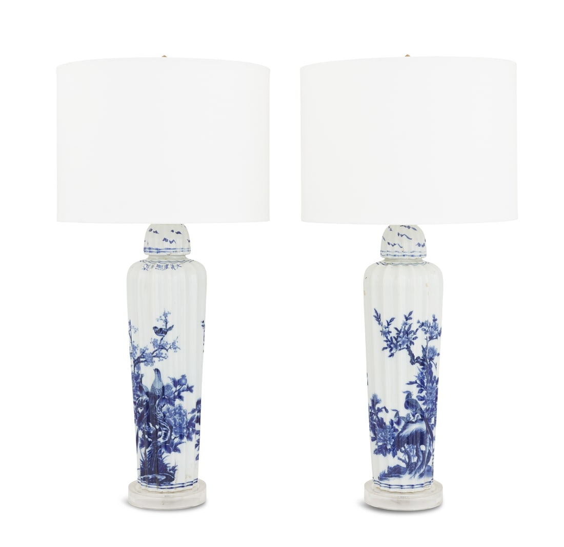 Pair of Unusual Blue and White Fluted Ginger Jars: Pair of Unusual Blue and White Porcelain Fluted Ginger Jars in the Chinese Taste now mounted as lamps, decorated with pheasants roosting in plum trees, and Chinese characters on the shoulders, mounted