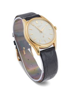 Patek Philippe First Series "Calatrava" Watch: Fine Patek Philippe First Series "Calatrava" Watch 18k yellow gold, ca. 1953-1960, the 36.00mm watch with a white porcelain dial, and a 12-600AT caliber movement and the original "PP" crown, reference