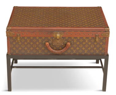 Louis Vuitton Printed Canvas Suitcase on Stand: Louis Vuitton Leather-Trimmed Printed Canvas Suitcase on Stand 20th century, covered in their signature printed canvas and trimmed in leather, the interior with a tray, now on a contemporary metal bas
