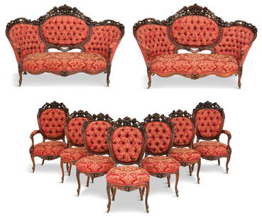 American Rococo Revival Rosewood Parlor Suite: Nine-Piece American Rococo Revival Rosewood Parlor Suite third quarter 19th century, attributed to Alexander Roux, New York, consisting of a pair of love seats, each exuberantly carved with a central