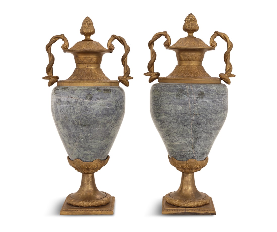Pair of Bronze and Marble Urns: Pair of Bronze and Marble Urns in the Neoclassical Taste the green marble bodies having bronze handles wrapped with molded serpents and bronze rims molded with lotus leaves, supporting anthemia-molded
