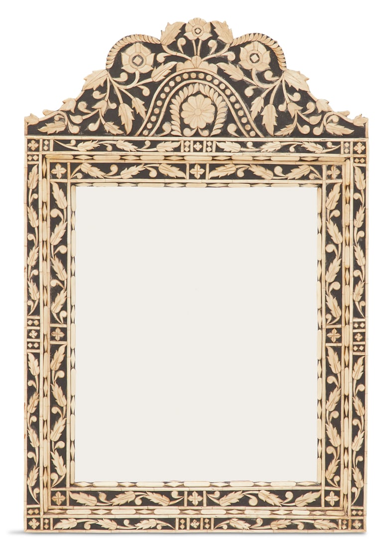 Anglo-Indian-Style Wall Mirror: Anglo-Indian-Style Wall Mirror 20th century, the ebonized wood frame featuring bone-inlaid designs around a central mirror plate. h. 36", w. 24"