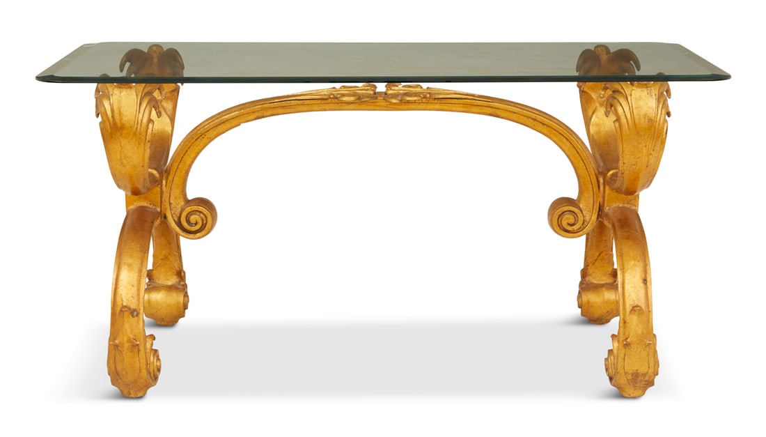 Gilt-Metal and Plate-Glass Center Table: Contemporary Gilt-Metal and Plate-Glass Center Table late 20th century, in the Baroque taste, the rectangular beveled glass top on a curule base with scroll feet. h. 28", w. 58", d. 36"
