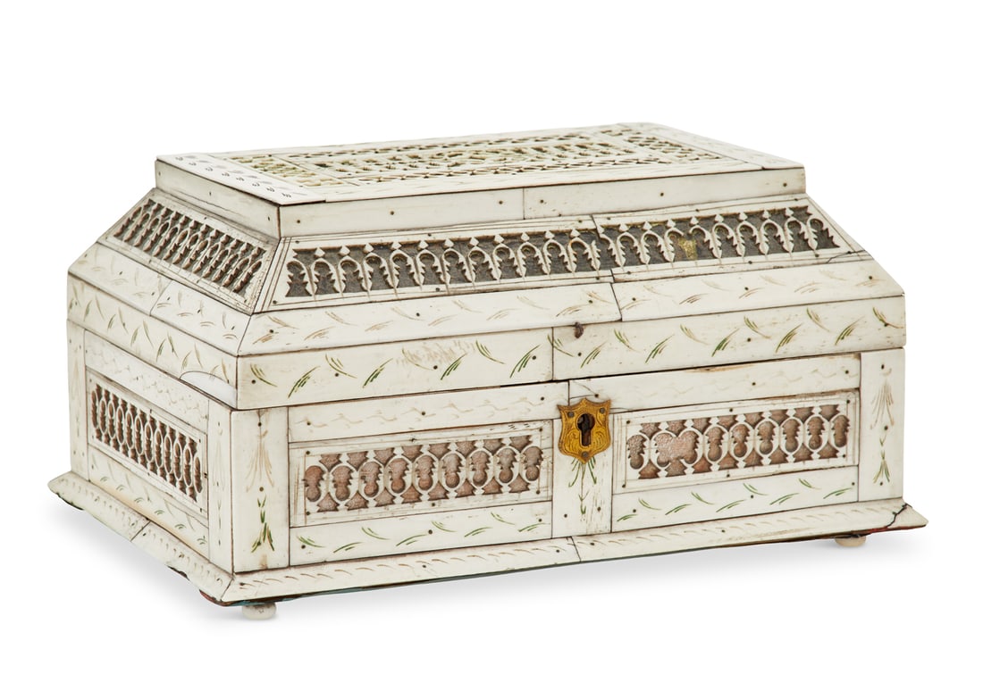 Russian Bone Prisoner of War Casket: Russian Prisoner of War Bone Casket ca. 1800, the cover and sides decorated with delicate piercing and trimmed with engraved flourishes, with an engraved brass escutcheon and turned feet, the interior