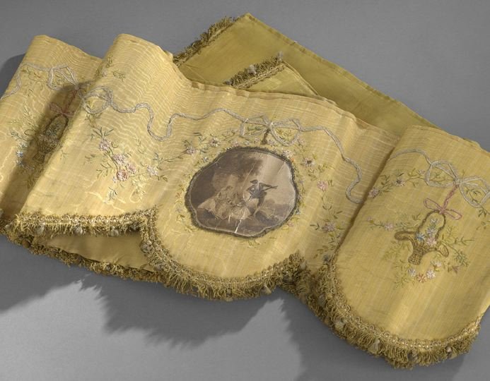 French Belle Epoch Ochre Silk Moire Valence: French Belle Epoch Ochre Silk Moire Valence, 1890-1900, with scalloped, fringed and tasseled front edges, centered by a sepia paper print of two 18th century women singing and being accompanied by a g