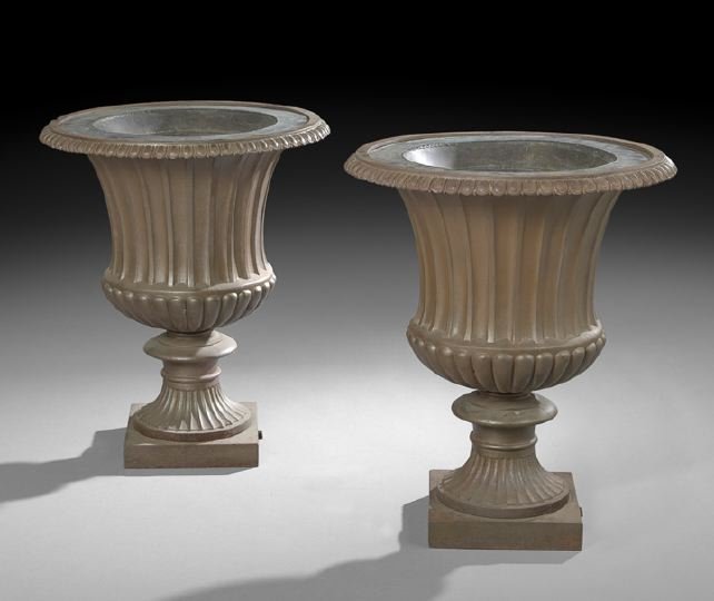 Pair of Neoclassical-Style Cast-Iron Garden Urns: Pair of Neoclassical-Style Cast-Iron Garden Urns with Tole Liners, each of campagna form with egg-and-dart rim, fluted and lobed body, h. 30-1/2", dia. 26".