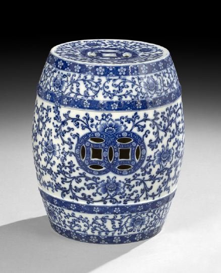 English Victorian Staffordshire Garden Seat: English Victorian Staffordshire Garden Seat, fourth quarter 19th century, barrel-shaped and pierced like Chinese export examples, the "flow blue" decoration contrasting borders of white flowers on a c