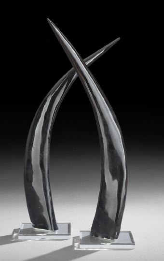 Large Pair of Polished Buffalo Horns on Stands: Impressive and Large Pair of Polished Buffalo Horns on Stands, the large horns, polished and displayed on square Lucite bases, h. 29", stand w. 7", stand d. 7".