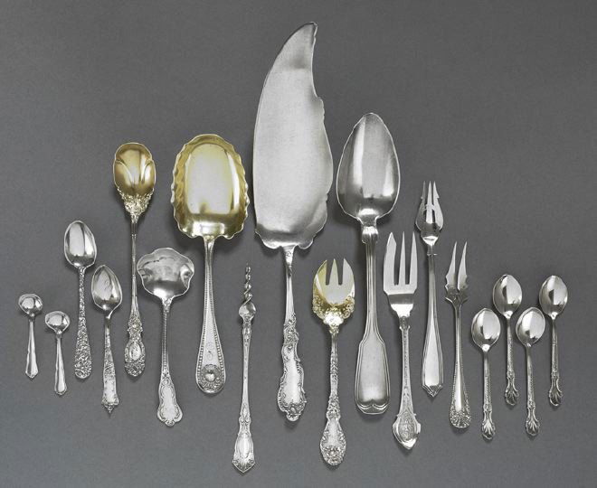 18 Pieces of American Sterling and Other Flatware: Eighteen Assorted Pieces of American Sterling and Other Flatware, 20th century, including American sterling pieces a Wood & Hughes "Fiddle Thread" tablespoon, l. 8", a Frank Smith "Baronial" ice cream