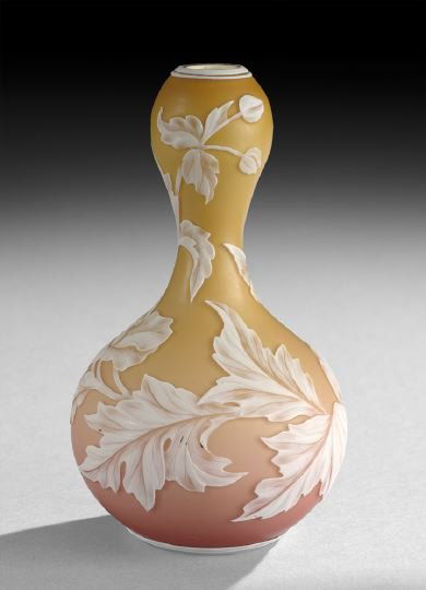 Thomas Webb Cameo Vase: Thomas Webb Cameo Vase, fourth quarter 19th century, English, of double gourd shape, the shaded peach body decorated with leaves, flowers, buds and a butterfly, signed "Thomas Webb and Sons" on base,