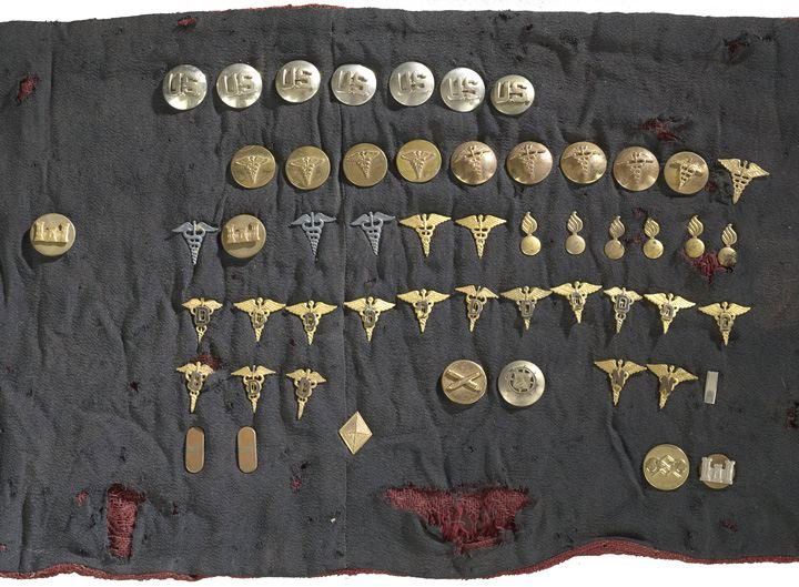 Fifty-Four Assorted U.S. Army Insignia: Fifty-Four Assorted U.S. Army Insignia, World War II / Korean War Era, including officer's and enlisted medical corps (three sterling silver), dental corps, ordnance, engineers, finance, artillery, tr