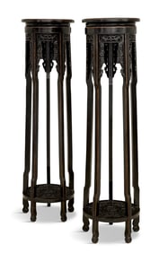 Pair of Chinese Ebonized Wood Torchere Stands