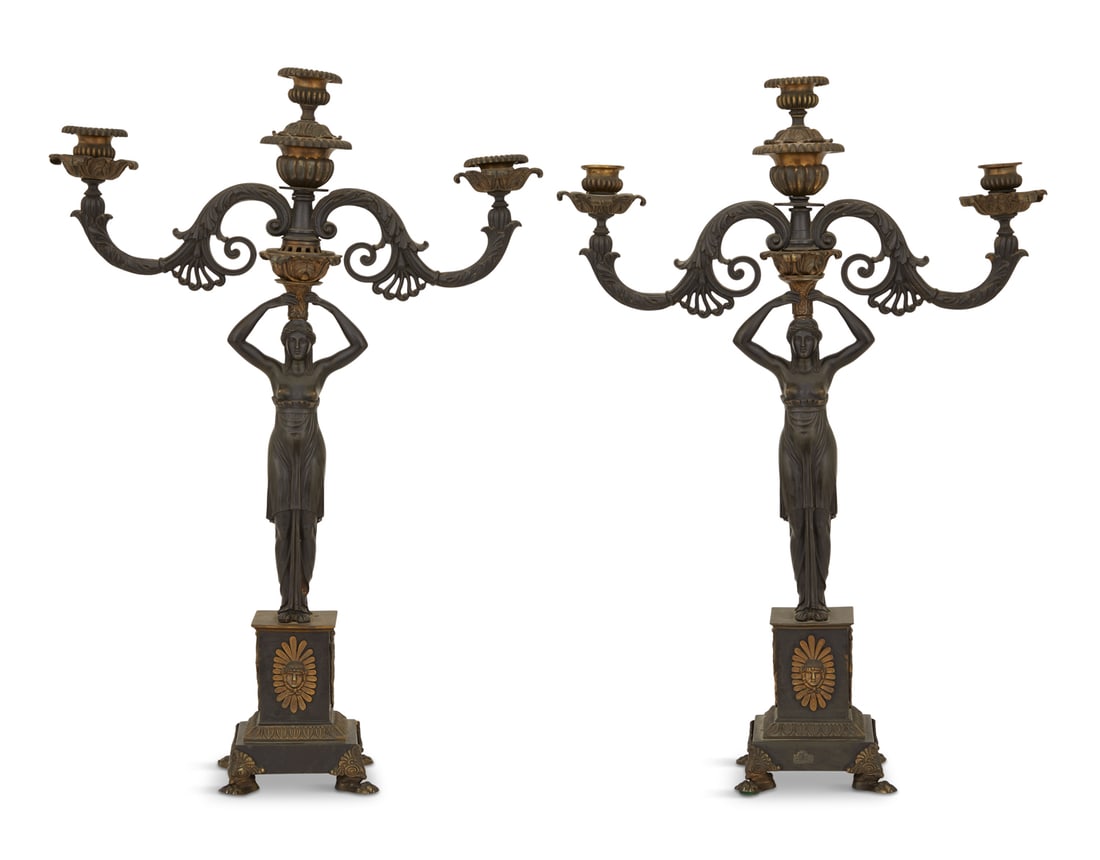 Monumental Regency Dore et Patine Candelabra: Pair of Monumental Regency Dore et Patine Candelabra first quarter 19th century, the reeded candle cups supported on leaf-molded and scrolled arms, mounted on Egyptian Revival "priestesses",