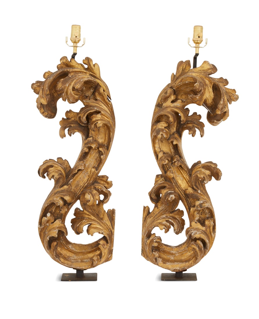 Pair of Italian Baroque Giltwood Fragment Lamps: Pair of Italian Baroque Giltwood Fragment Lamps fourth quarter 19th century, composed of bold, leaf-carved scrollwork, now on acrylic bases. h. 37-1/2", w. 10", d. 8"