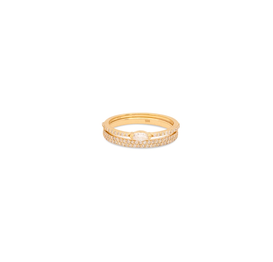 Two Diamond Stackable Rings: Two Diamond Stackable Rings14k yellow gold, the rings mounted with round brilliant-cut and marquise-cut diamonds weighing approximately 0.60 carats in total.size 6-3/4, total weight 2.8 grams
