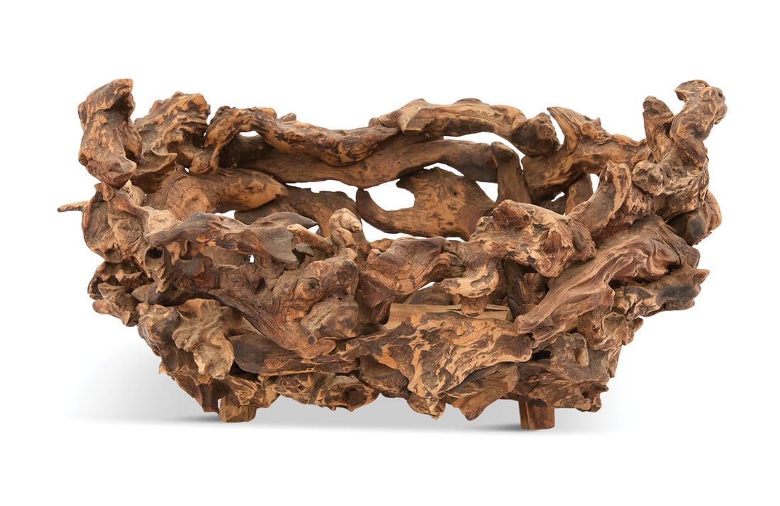 French Grapevine Root Basket: French Grapevine Root Basket 20th century, the oval basket composed of twisted and weathered grapevine roots, set with handles, the bottom with a solid board. h. 12-1/4", w. 23", d. 19"