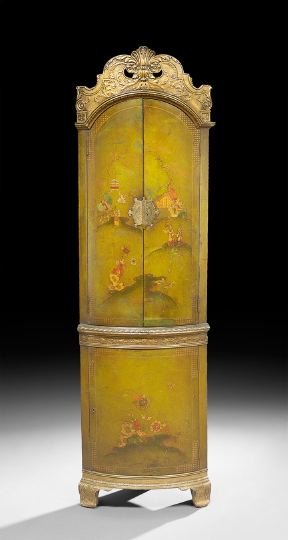 Georgian-Style Polychrome Corner Cabinet: Georgian-Style Polychrome Corner Cabinet, 20th century, in the chinoiserie taste, of bowed form, the domed and pierced cornice centered by an acanthine carving and above a case fitted with two cupboar