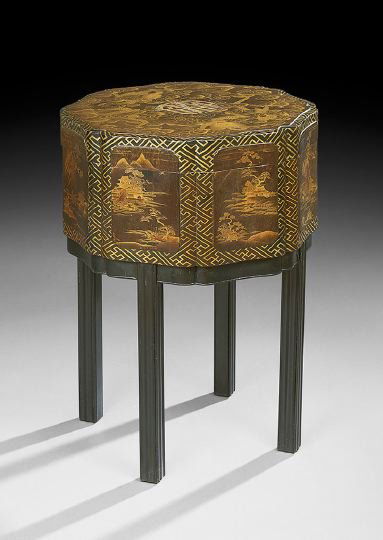 Chinese Black-Lacquered Storage Box: Chinese Black-Lacquered Storage Box, late 19th century, of shaped circular form, the lid with elaborate dragon amongst cloud designs centering a calligraphic pattern, lifting off to a void interior, t