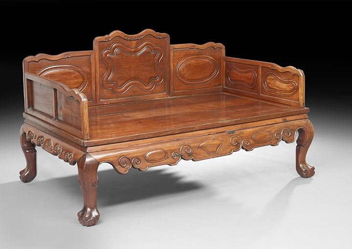 Chinese Hung Mu Luo Han Chuan Bed: Chinese Hung Mu Luo Han Chuan Bed, 19th century, the trisected back with a shaped crest and with carved panels, the lower sides paneled en suite, the banded top raised above a shaped apron on shaped p