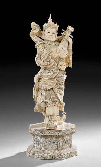 Chinese Ivory Clad Carved Figure: Chinese Ivory Clad Carved Figure, 20th century, the Buddhist figure of a heavenly general, ivory and bone plaques over a wooden base, h. 30".